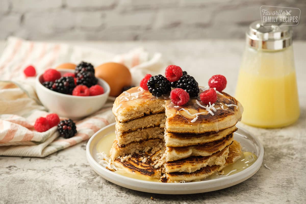 Side view of stack of Gluten Free pancakes with a slice cut out