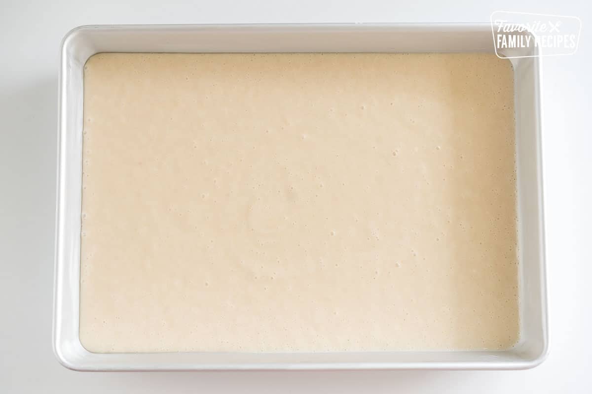 vanilla cake batter in a baking dish
