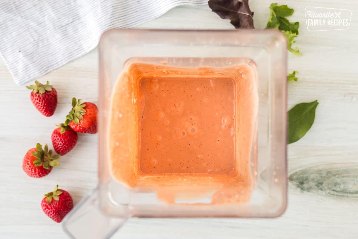 Blended Strawberry Vinaigrette in a blender.