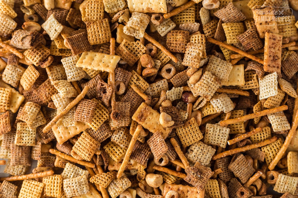 A close up view of chex mix showing off all of the ingredients
