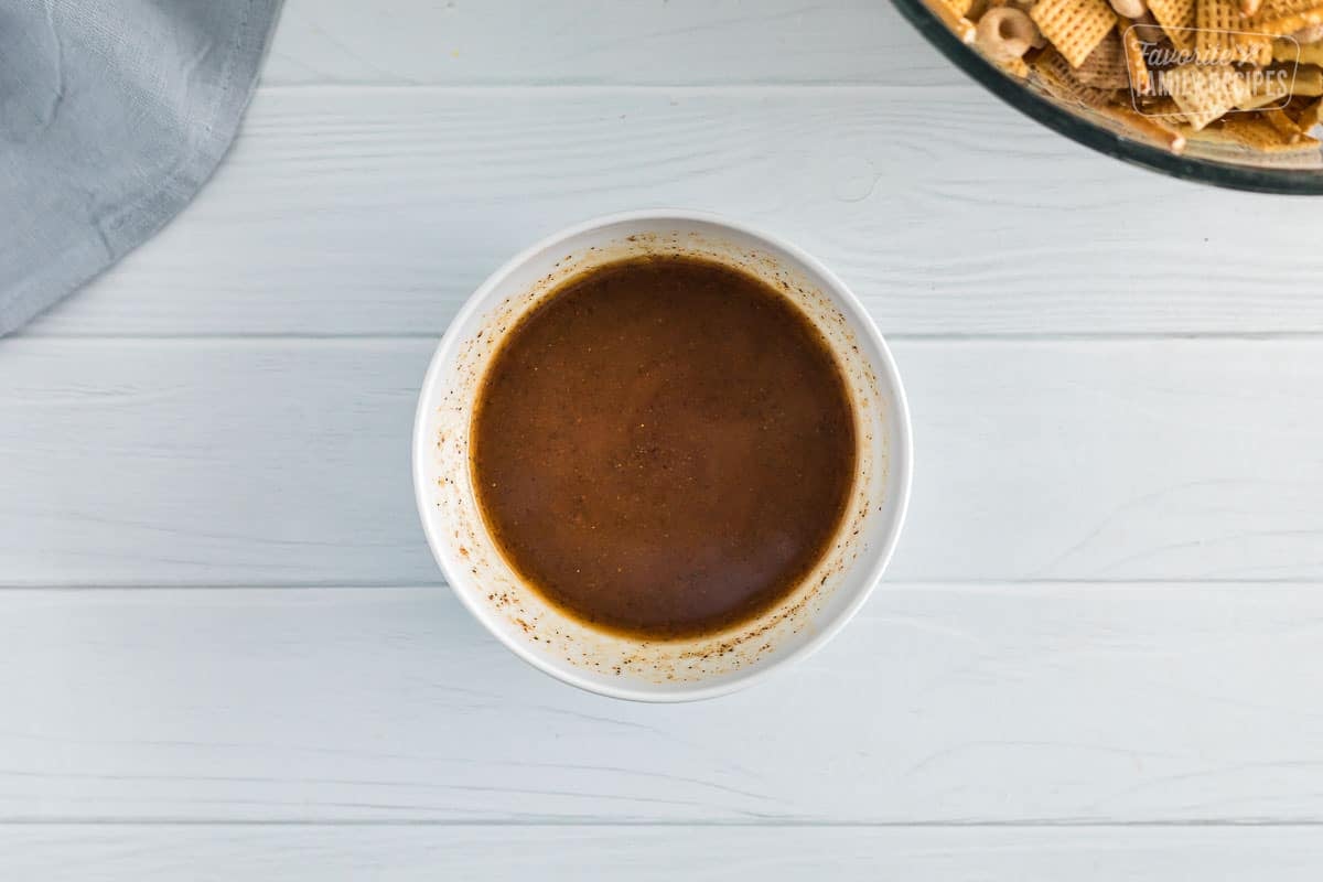 A bowl of Seasoning Sauce for chex mix.