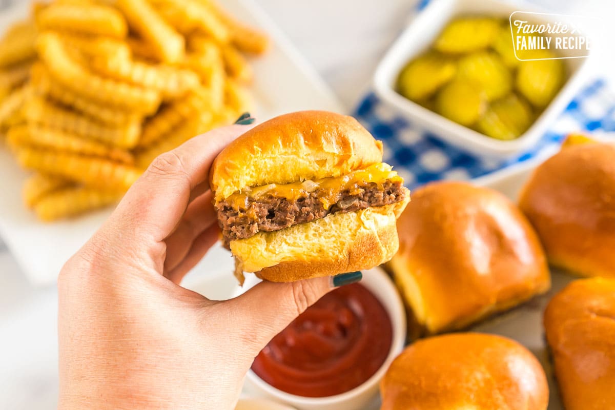 A hand holding a slider