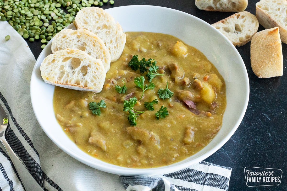 A side view of a bowl of split pea soup.