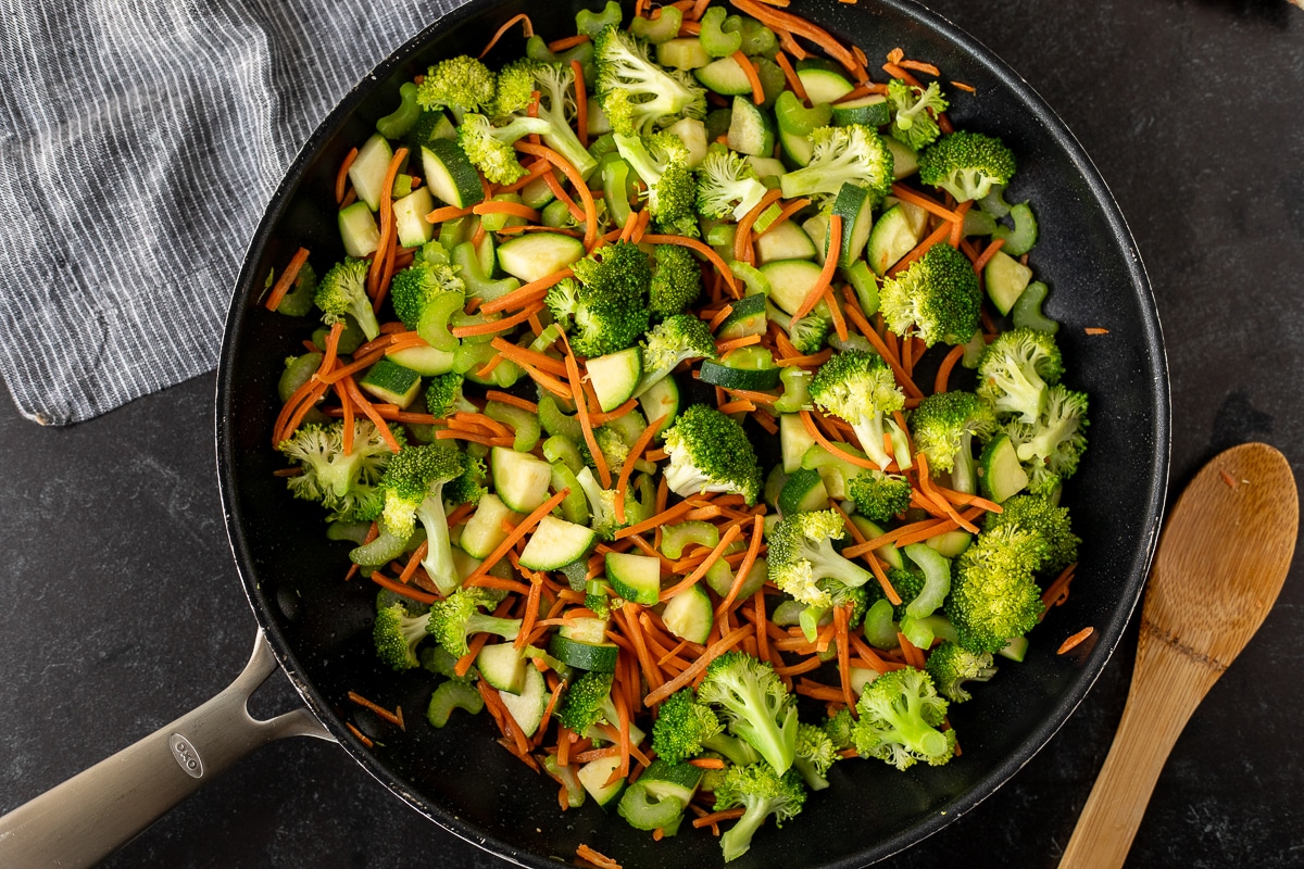 Skillet with stir fried vegetables.