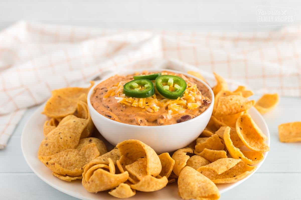 a Plate of chili cheese dip and chips