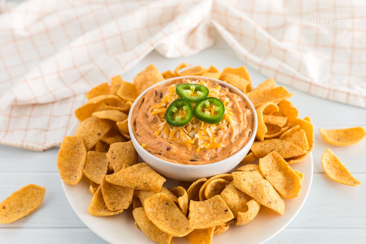 a Plate of chili cheese dip and chips
