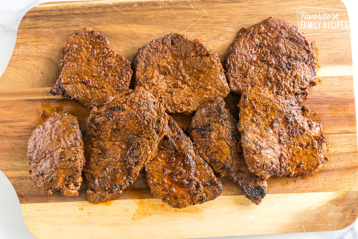 Cooked steak on a cutting board