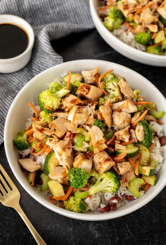 Chicken Rice Bowls with a fork.