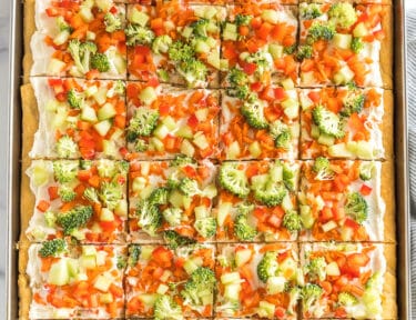 Crescent Roll Veggie Pizza on a baking sheet cut into squares