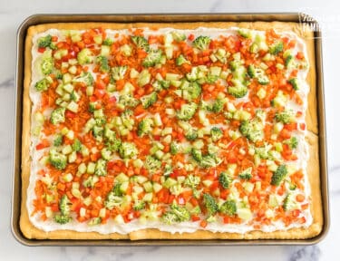 Crescent Roll Veggie Pizza on a baking sheet