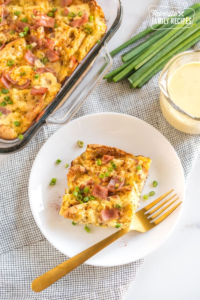 A slice of Eggs Benedict Casserole on a plate