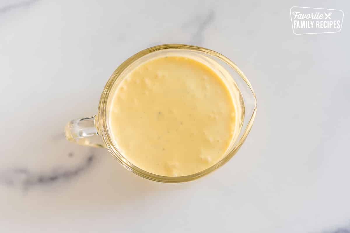 a small pitcher of hollandaise sauce