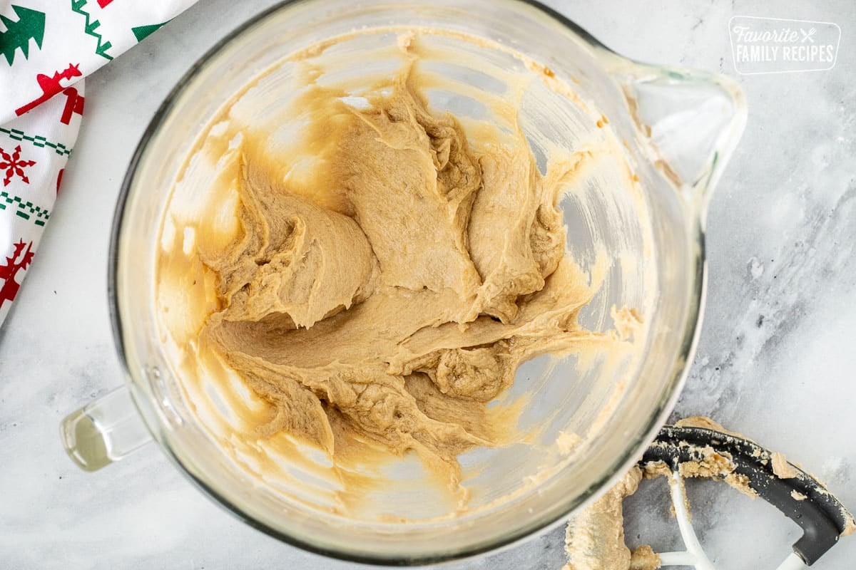 Mixing bowl with creamed butter, sugar and eggs.