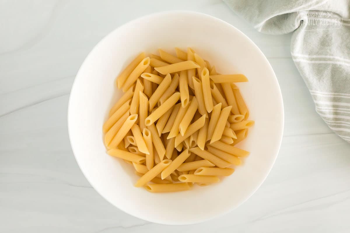 Cooked penne pasta in a bowl