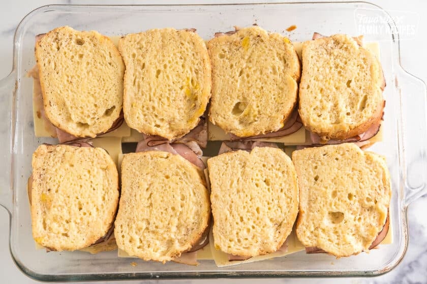 French toast covered with egg mixture in a baking dish