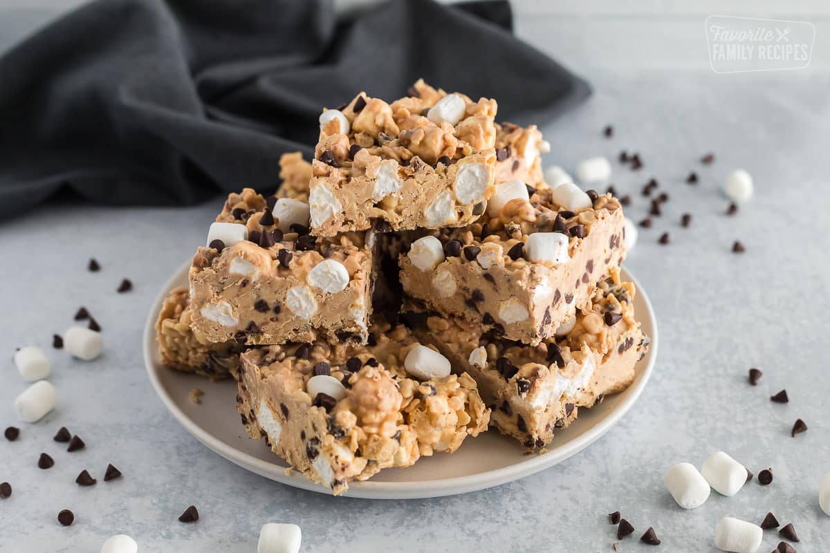 squares of peanut butter bark stacked on top of a plate