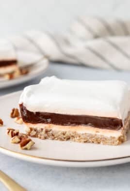 Two plates with slices of Mud Pie.