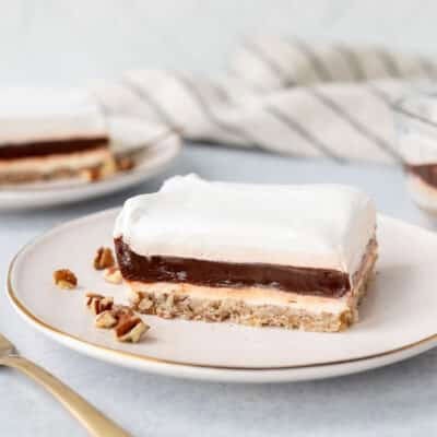 Two plates with slices of Mud Pie.