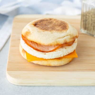 English muffin with cheese, egg and Canadian bacon.