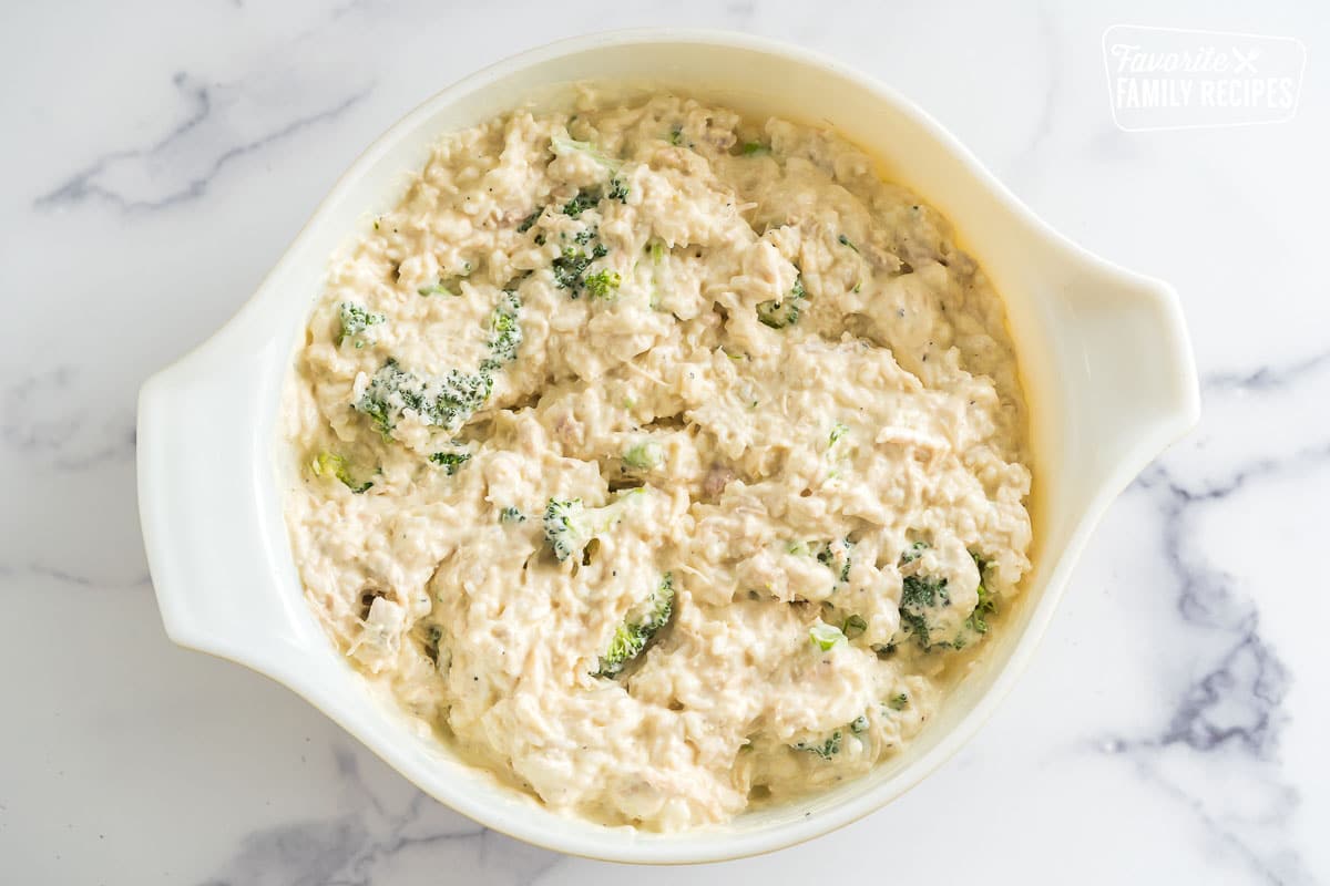 Rice, broccoli, chicken, and sauce mixed in a bowl.