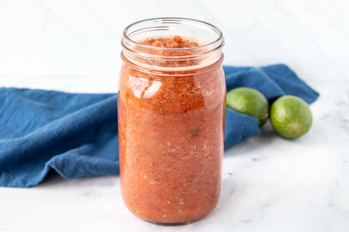 Jar of blended salsa.