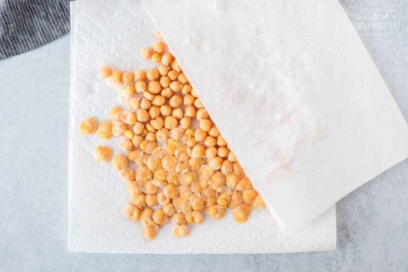Garbanzo beans smashed on paper towels