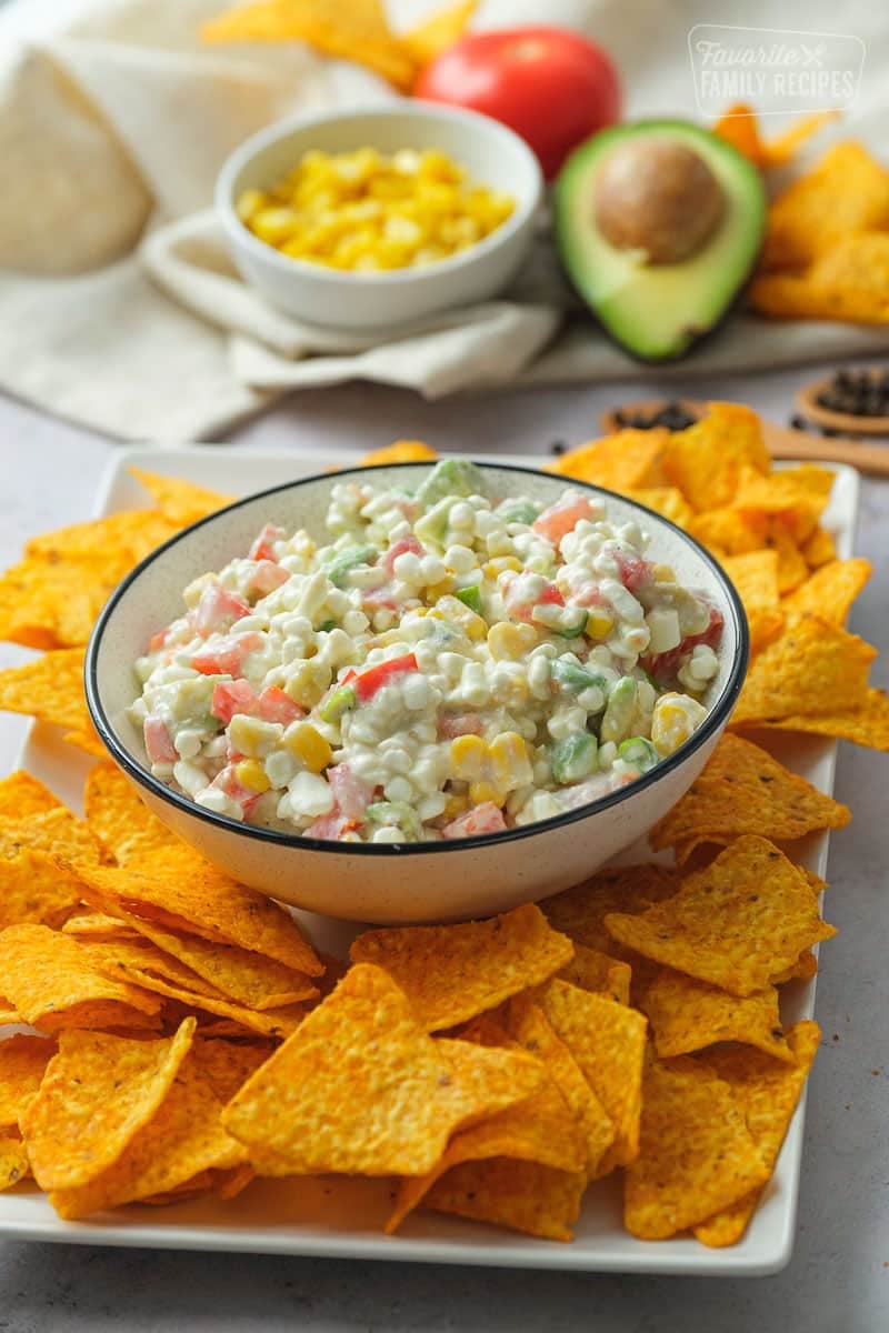 Bowl of Dorito Dip surrounded by Dorito chips