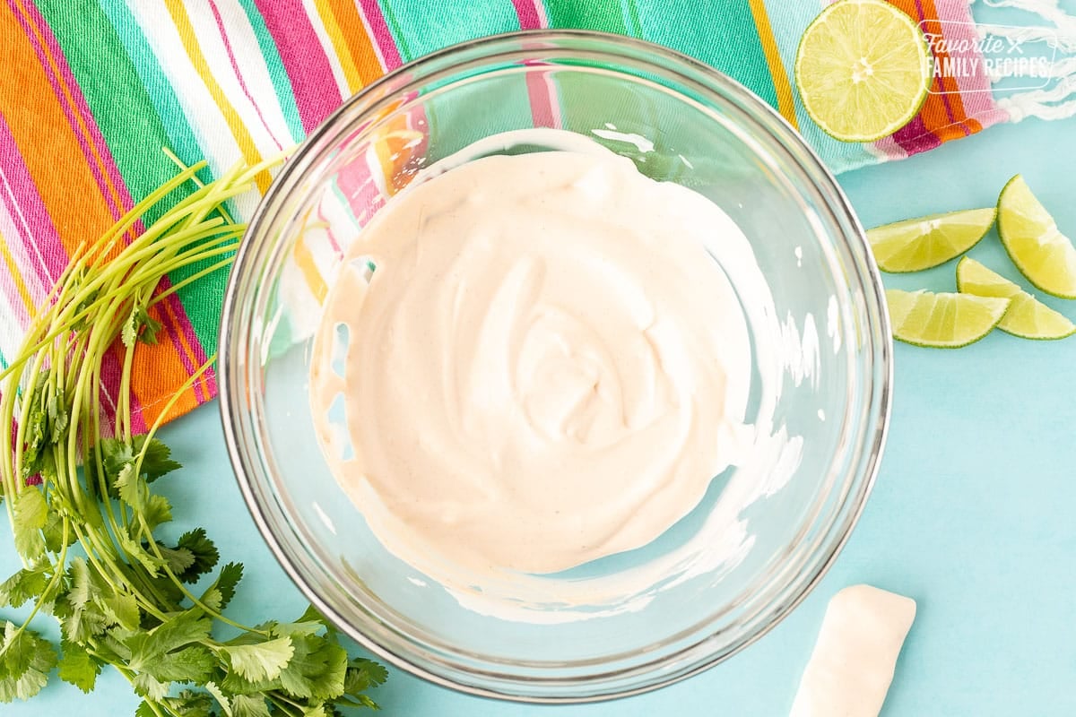 Mixing bowl with white sauce for corn.