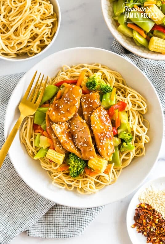 A bowl of honey sesame chicken