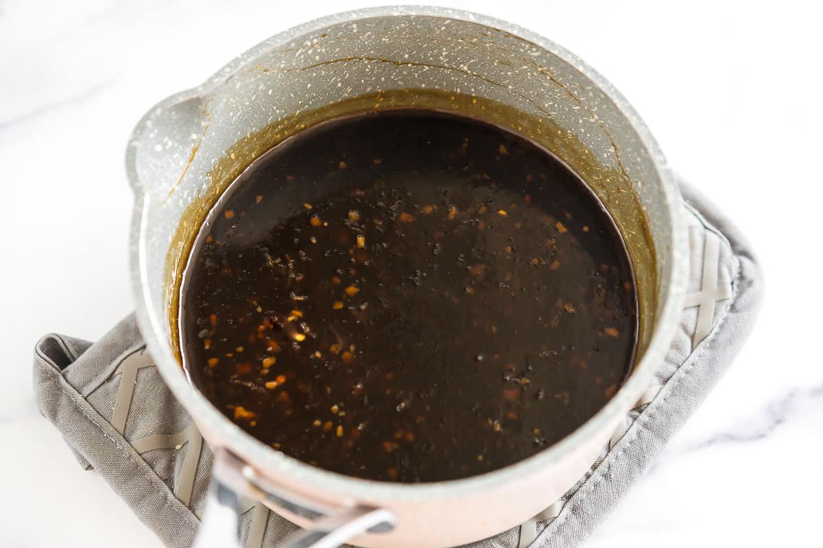 Dark brown sauce in a sauce pan