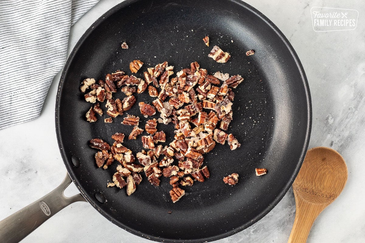 Sugar and pecans in skillet.