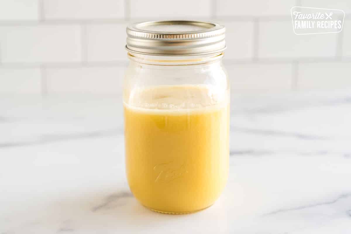 yellow vinaigrette in a mason jar