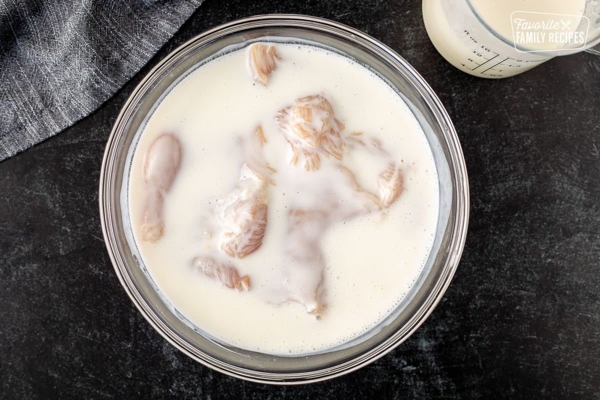 Bowl of chicken and buttermilk.