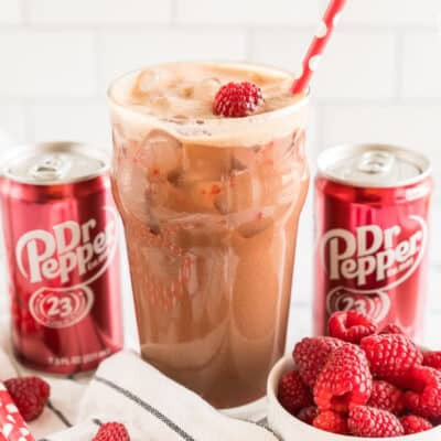 A Swig Raspberry Dream dirty soda in a glass