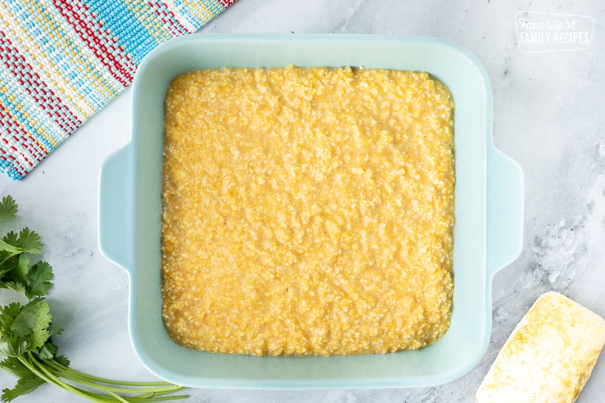 Casserole dish with Sweet Corn Cakes Tomalitos batter.