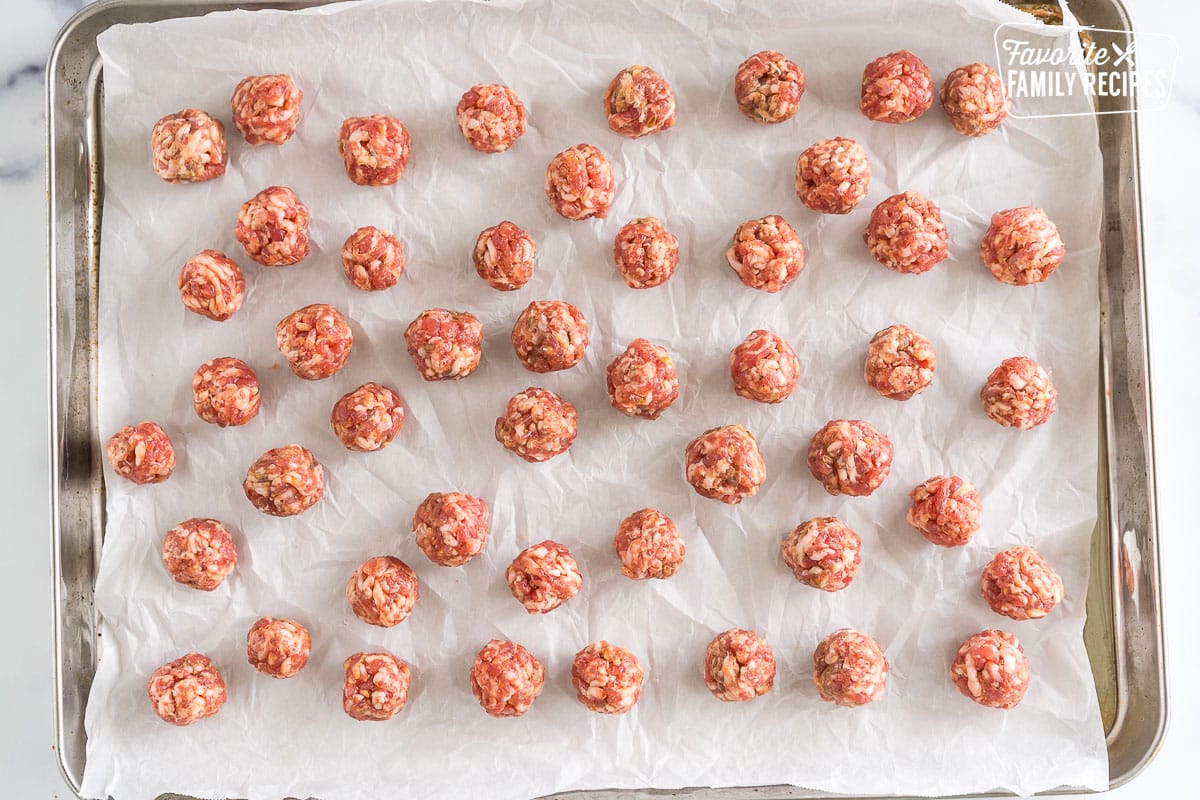 Italian sausage rolled into balls and placed on a baking sheet