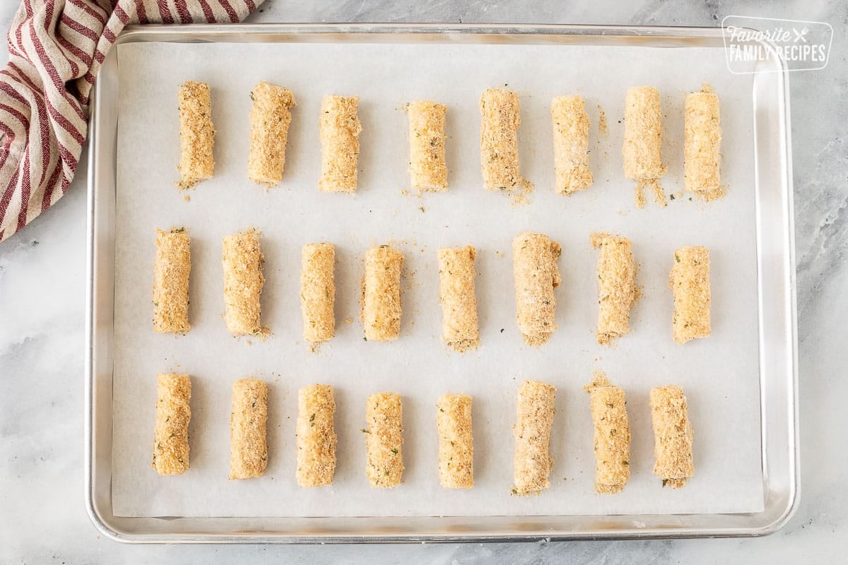 Sheet of breaded mozzarella sticks.