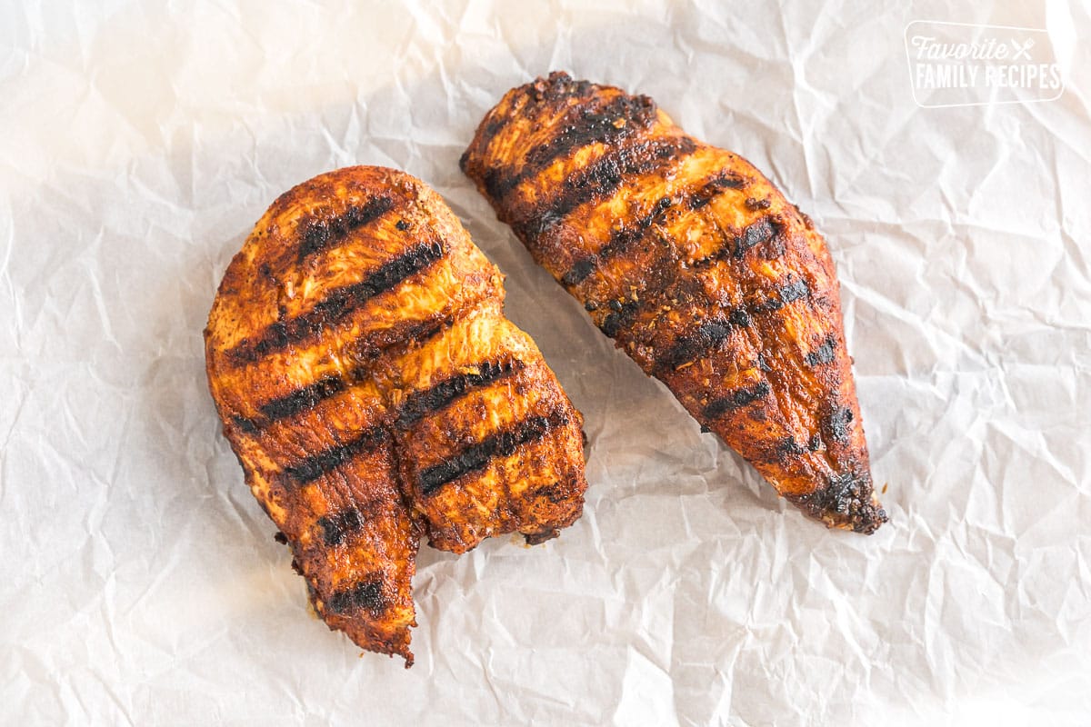 Two pieces of seasoned grilled chicken
