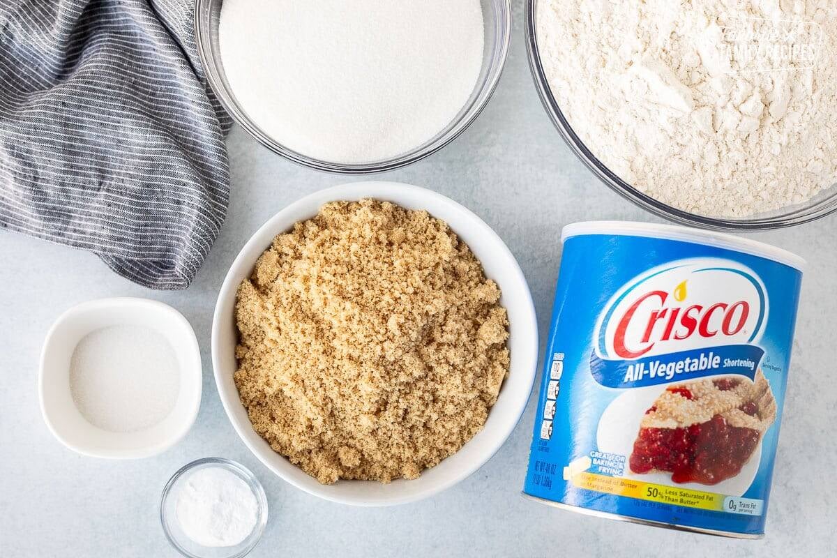 Ingredients to make Cookie Dough Mix including Crisco shortening, brown sugar, sugar, flour, salt and baking soda.