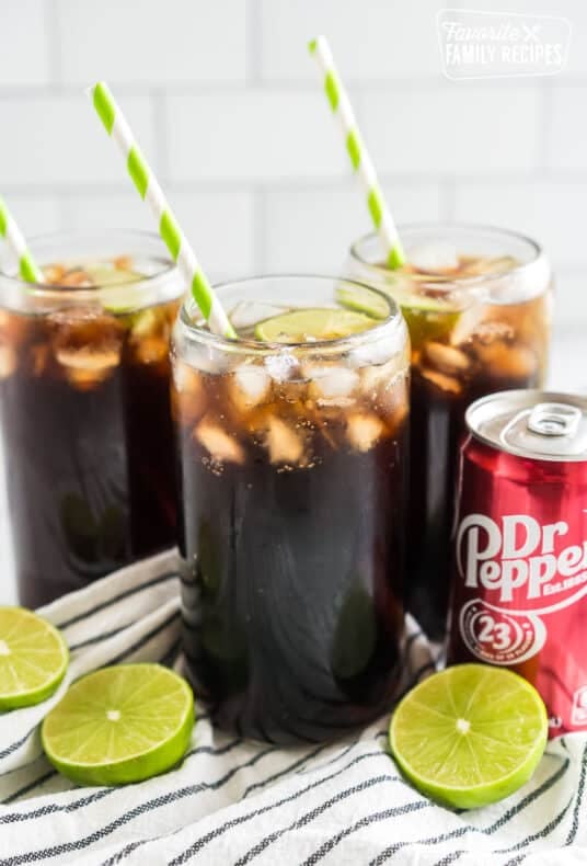 Dirty Dr Pepper with lime and a straw