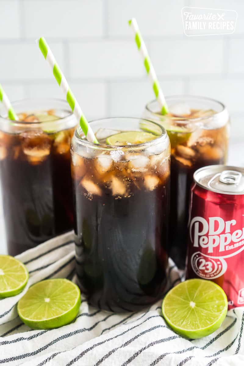 Dirty Dr Pepper with lime and a straw