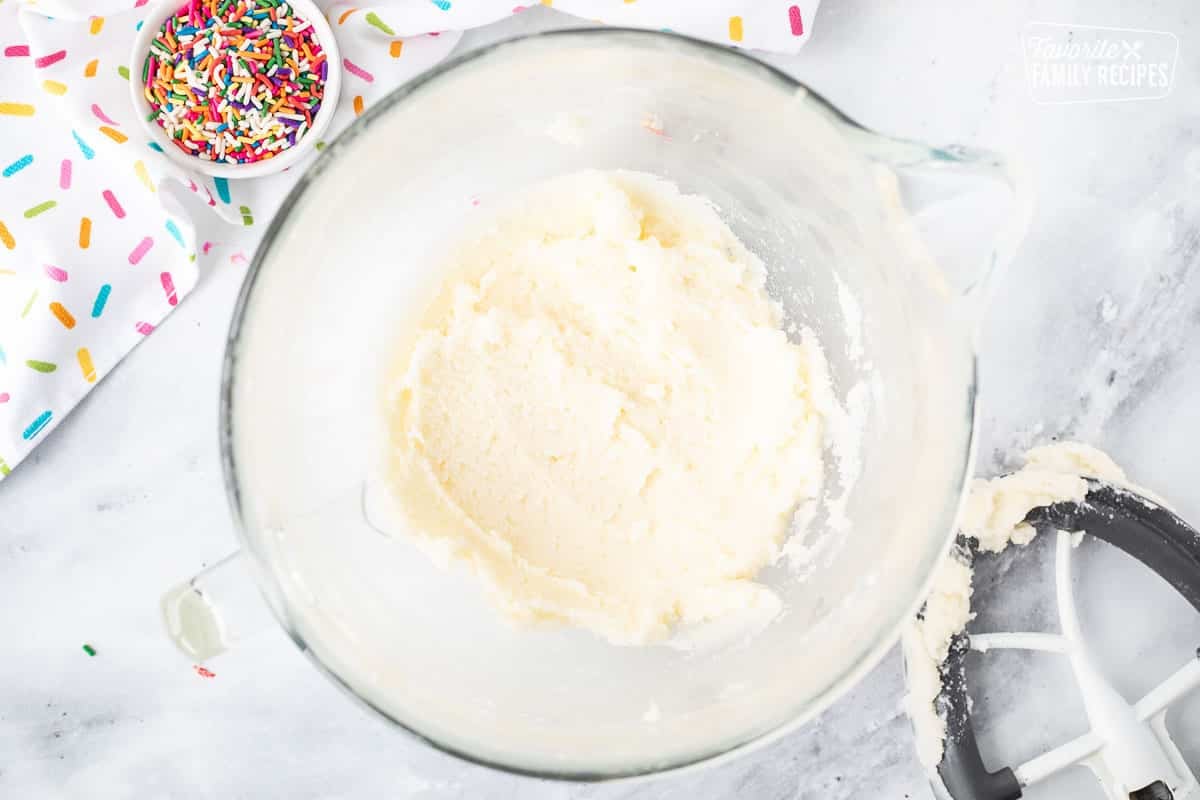 Mixing bowl with creamed butter and sugar.