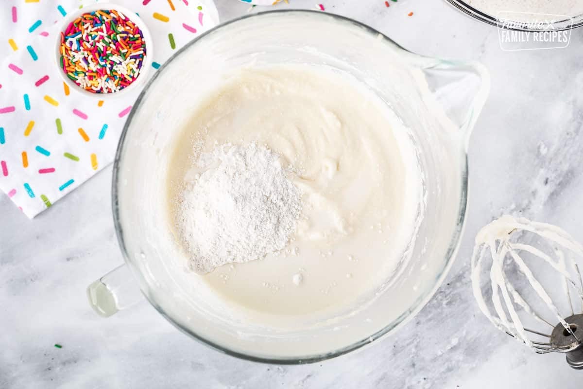 Mixing bowl with batter flour and milk to mix.