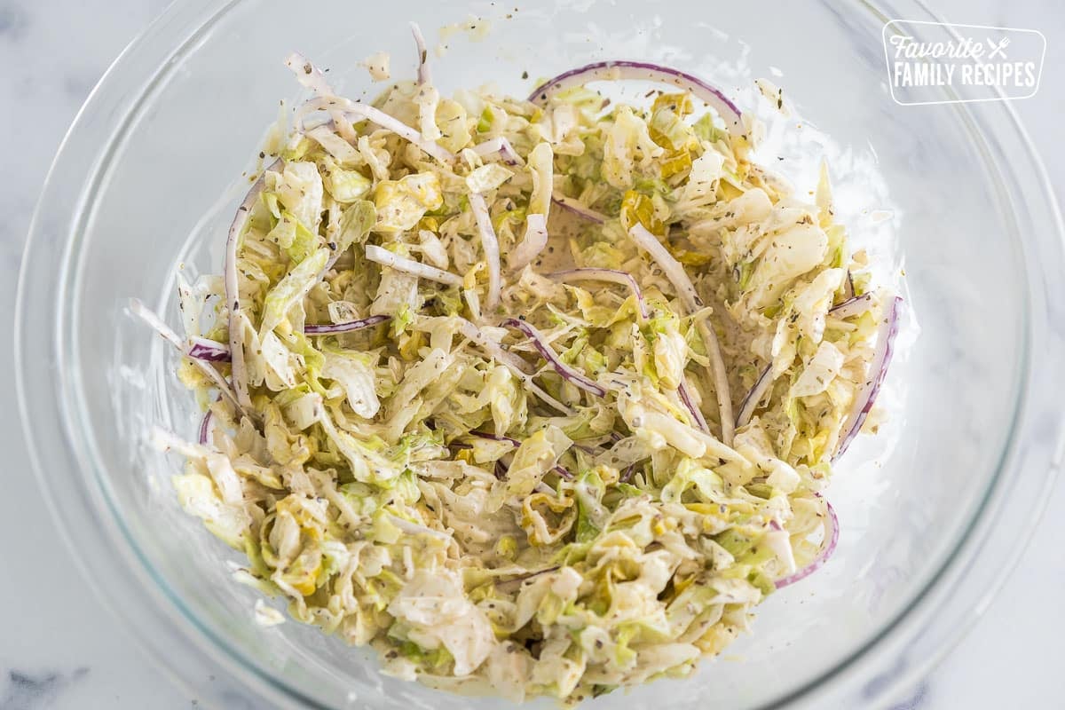 The grinder salad mixture in a glass bowl.