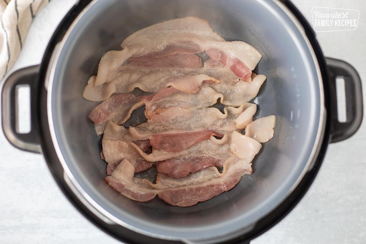 Cooking bacon slices in Instant Pot.