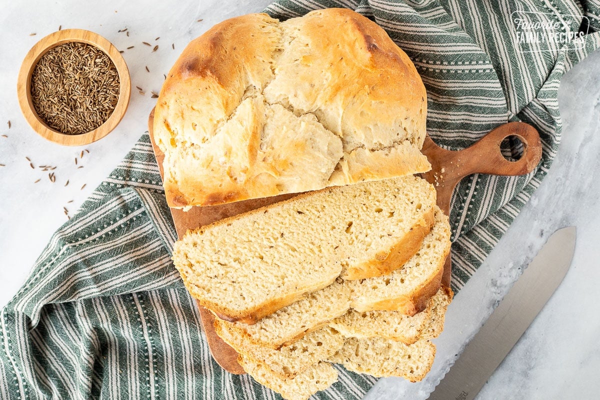 Sliced loaf of Irish Soda Bread on a cutting board.