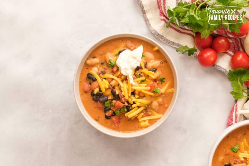 Italian sausage chili in a white bowl.