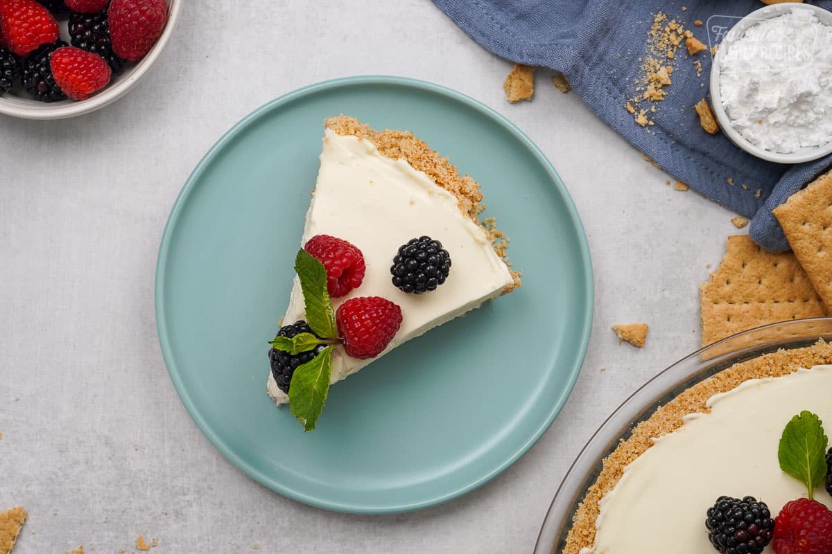 Overhead shot of No bake cheesecake on a blue plate.