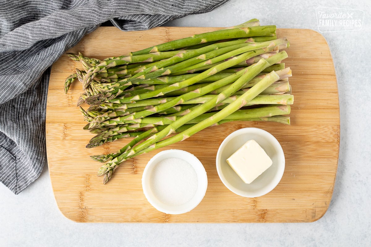 Ingredients to make Sweet Sautéed Asparagus including asparagus, sugar and butter.