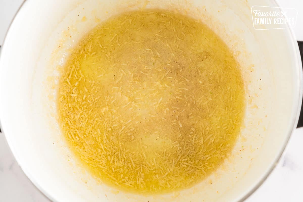 garlic sautéing in a pot
